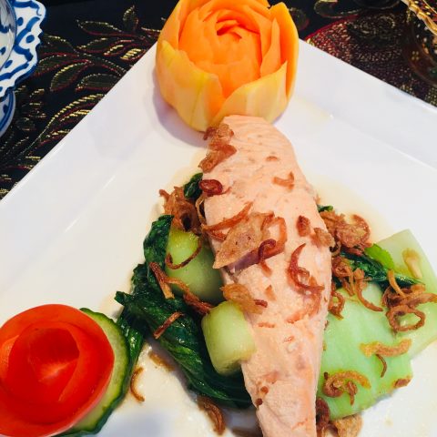 Wild Scottish Salmon on a bed of Bok Chou with Nam Plah & Soya Sauce sprinkled with crispy red onions